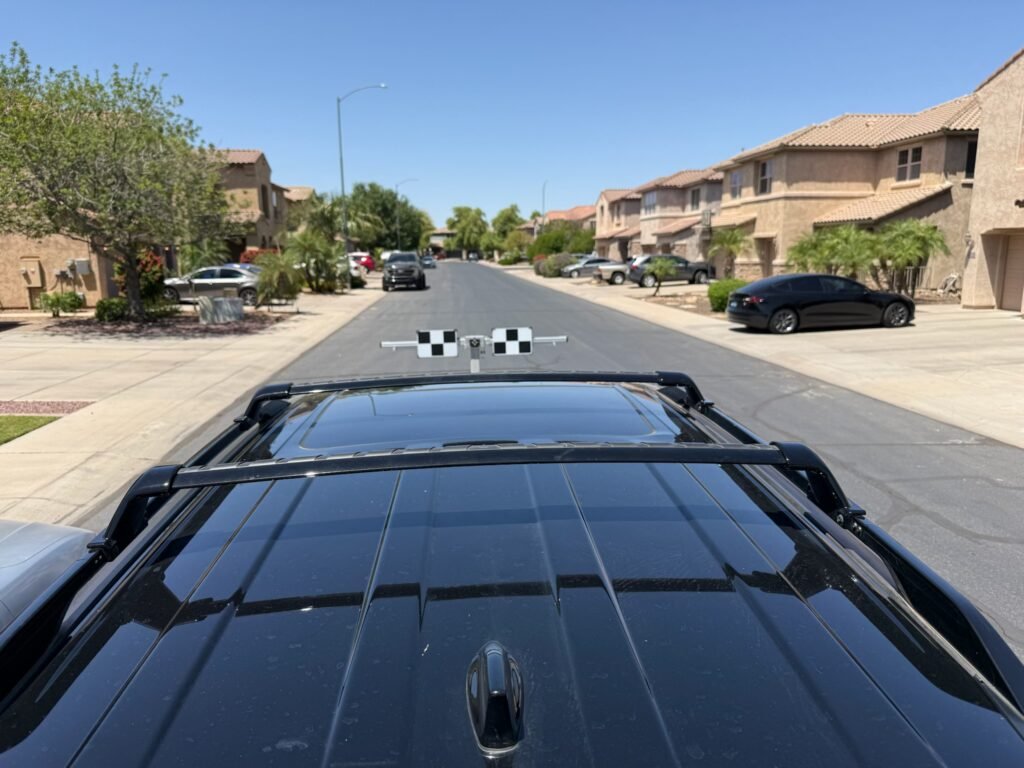 Here’s What You’ll Learn in This Article Learn why ADAS calibration matters after windshield replacement, how uncalibrated sensors can affect safety features like lane assist and automatic braking, and why driving without proper calibration creates serious safety and legal risks. Introduction You just got your windshield replaced. Looks perfect. Clear view. No cracks. The shop told you the job was done and sent you on your way. But nobody mentioned anything about recalibrating the camera stuck to your windshield behind the mirror. You did not even know that camera existed until right now. And you definitely did not know it needs recalibration after glass work. So now you are wondering if you can just drive normally or if something bad might happen. Your car seems fine. All the buttons and screens work like usual. The lane warnings still beep sometimes. Nothing feels broken. But here is the reality. That camera moved when your windshield came out and went back in. Even tiny movements throw off every safety feature depending on that camera. Your automatic braking, lane keeping, adaptive cruise, all of it now works from incorrect data. The question is not really whether your car drives. It obviously drives. The real question is whether driving with uncalibrated ADAS sensors is safe. Whether those safety systems you count on will actually work when you need them. Premiere Auto Glass sees this exact situation constantly. People get windshields replaced elsewhere. Nobody calibrates the ADAS. Then customers show up weeks later asking why their safety features act weird. This guide answers the safety question honestly and explains what really happens when you drive around with sensors that are not calibrated properly. What ADAS sensors actually do while you drive Before talking about safety with uncalibrated sensors, you need to understand what these sensors do when they work correctly. ADAS stands for Advanced Driver Assistance Systems. Basically every tech feature in your car designed to help prevent crashes and keep you safer. The camera behind your rearview mirror handles most of this work. It watches everything constantly while you drive. Never takes breaks. Never gets distracted. Just monitors the road second after second. That camera tracks lane markings on both sides of your vehicle. It knows where your car sits relative to those lines. When you start drifting toward a line without your turn signal on, the lane departure warning beeps at you. When you drift too far, the lane keeping assist gently steers you back toward the center. The camera watches vehicles ahead of you. It measures exactly how far away they are and how fast the gap closes or opens. When you get too close too fast, forward collision warning screams at you. When a crash is about to happen and you are not reacting, automatic emergency braking slams the brakes without you touching anything. The camera reads your speed and compares it to the vehicle ahead. Adaptive cruise control uses this to maintain whatever following distance you set. The system speeds up and slows down automatically to keep that gap consistent without you touching the pedals. The camera reads traffic signs as you pass them. Speed limits. Construction zones. School zones. It displays this info on your dashboard so you always know current restrictions without taking your eyes off the road to read signs. According to the National Highway Traffic Safety Administration, properly functioning ADAS features prevent approximately 40% of crashes that would otherwise occur, saving an estimated 15,000 lives annually when all vehicles on the road have working systems. All of these features depend entirely on the camera seeing the road from exactly the right angle. When the camera angle is correct, the system makes accurate calculations about distances, speeds, and positions. When the angle is off even slightly, every calculation becomes wrong. What actually goes wrong with uncalibrated sensors Driving with uncalibrated ADAS does not make your car suddenly break down or refuse to start. The problems are way more subtle and way more dangerous because of that subtlety. Your car feels totally normal. Everything looks fine on the surface. The safety systems still activate and make sounds and show lights on the dash. You have no obvious reason to think anything is wrong. But underneath the normal appearance, those systems are making decisions based on incorrect information. And those bad decisions create real danger. Lane departure warnings go off at completely wrong times. The camera thinks you are drifting toward the left line when you are actually centered perfectly in your lane. The warning beeps constantly even though you are doing nothing wrong. So you learn to ignore it. You tune it out as background noise. Then one day you actually do start drifting and you miss the warning because you trained yourself to ignore all the false alarms. Or the opposite happens. The camera cannot see the lane markings correctly from its shifted angle. It stays silent when you genuinely drift out of your lane. You count on the warning to alert you, but it never comes. You drift into another lane without realizing it until you hear horns or worse. Automatic emergency braking becomes unpredictable. The camera calculates distance wrong because it views the road from an incorrect angle. It thinks the car ahead is closer than it really is. Suddenly your brakes slam on for no reason while you are driving 65 on the highway. The person behind you barely stops in time. You almost caused a pileup because your safety system activated incorrectly. Or again, the opposite. The camera thinks you have more distance than you actually do. A real emergency happens. The car ahead stops suddenly. Your automatic braking should kick in but stays silent. It fails to activate because the camera's bad data says everything is fine when it is not. You slam into the vehicle ahead at full speed. The feature designed to prevent rear-end crashes just failed to do its one job. Lane keeping assist steers you the wrong direction. This one is genuinely scary. The camera thinks your car sits in a different position than it actually does. It tries to correct you back to center. But its idea of center is wrong. So it steers you toward the lane line instead of away from it. You fight the steering wheel wondering why your car is actively trying to leave your lane. Adaptive cruise maintains wrong following distances. The camera calculates distance incorrectly. Your car either crowds the vehicle ahead dangerously close, or it leaves massive gaps that make other drivers constantly cut in front of you. Either way the feature becomes useless and potentially dangerous. Research published in the Journal of Safety Research found that vehicles with misaligned ADAS cameras showed automatic emergency braking failure rates above 40% in controlled test scenarios, compared to less than 2% failure rates for properly calibrated systems. The terrifying part about all of this is how normal everything feels until something goes wrong. You drive for days or weeks with uncalibrated ADAS sensors. Nothing bad happens. You start thinking maybe calibration does not really matter. Then one day you need automatic braking in a genuine emergency. And it fails. Or it activates incorrectly and causes the emergency. Either way, the outcome is bad. Why people think uncalibrated sensors are fine Lots of people drive around with uncalibrated ADAS for months without realizing anything is wrong. This creates a false sense that calibration does not really matter. Several reasons explain why people miss the warning signs. Dashboard warning lights do not always appear immediately. Modern cars run constant self-checks on their systems. But those checks look for complete system failures, not subtle misalignment. The car knows the camera is connected and turned on. It does not always detect that the camera angle is slightly off. So no warning light appears even though the system is not working correctly. The false activations happen randomly at first. Your lane warning beeps once when you are driving straight. Weird, but whatever. It does not happen again for three days. Easy to dismiss as a glitch. You do not connect it to your recent windshield replacement because the shop never mentioned calibration. People adapt to the incorrect behavior. Your adaptive cruise leaves bigger gaps than before. You just assume that is how it works now. Maybe an update changed the settings. You do not realize the camera is calculating distance wrong. You adapted to the problem instead of recognizing it as a problem. Some features fail silently. Traffic sign recognition just stops showing speed limits. You figure maybe the feature stopped working and you make a mental note to ask about it eventually. You do not realize the camera cannot read signs from its new angle. You do not connect it to uncalibrated sensors because again, nobody told you calibration matters. Most people do not understand what ADAS is or how it works. They know their car has some safety features. They do not know how those features connect to the windshield camera. They definitely do not know windshield replacement requires recalibration. The knowledge gap is massive. Data from AAA shows that only 32% of drivers understand that windshield replacement affects ADAS functionality, and fewer than 20% know that recalibration is required after glass work. All of these factors combine to create situations where people drive with dangerously uncalibrated systems without realizing it. They think everything is fine because nothing obviously broke. But safe and appearing safe are completely different things. Premiere Auto Glass has talked to countless customers who drove for months with uncalibrated ADAS after getting glass work elsewhere. Once proper calibration happens, they always say the same thing. They had no idea how wrong everything was until they experienced how it should actually work. The legal question nobody thinks about Beyond the pure safety issues, driving with uncalibrated ADAS creates potential legal problems most people never consider. Insurance companies can deny claims. Some insurance policies have specific language about maintaining vehicle safety systems in proper working condition. If you have an accident and the insurance company discovers your ADAS was never recalibrated after windshield work, they might deny your claim entirely. You violated the terms by not maintaining required safety equipment properly. You might face liability in accidents. Say your uncalibrated automatic braking fails to activate and you rear-end someone. The other driver's attorney subpoenas your vehicle service records. They discover you had windshield work done three months ago without ADAS recalibration. Now they argue you were negligent by driving with known faulty safety systems. Your liability just increased significantly. Some states are adding ADAS checks to inspections. Vehicle safety inspections in states like Texas and New York are starting to include basic ADAS functionality checks. If your systems do not work correctly due to uncalibrated sensors, your vehicle can fail inspection. That means no registration renewal until you fix it. Manufacturers can void warranties. Some vehicle warranties specifically require following proper service procedures including ADAS recalibration after any work affecting sensors. Skip calibration and you potentially void warranty coverage on related systems. These legal and financial risks stack on top of the safety risks. Driving with uncalibrated ADAS exposes you to way more than just accident potential. So can you drive safely without calibrated ADAS sensors? The direct answer to the title question is no. You cannot drive safely with uncalibrated ADAS sensors. Can you physically drive? Yes. The car starts. It moves. It steers. Nothing prevents you from driving. But safe means the vehicle operates as designed with all safety systems functioning correctly. Uncalibrated ADAS sensors mean your safety systems are not functioning correctly even when they appear to work. You lose the protection those systems provide. Features designed to prevent crashes might fail to activate when needed. Worse, they might activate incorrectly and cause crashes they were designed to prevent. The risk is not theoretical. Real accidents happen because of uncalibrated ADAS. People get hurt. Vehicles get totaled. Legal problems arise. All because someone skipped a required calibration step. Some people argue they drove for years without these features before ADAS existed, so they can drive fine with them not working. That argument misses the point completely. Once you have ADAS features, you subconsciously rely on them. You develop driving habits that assume those features will activate when needed. When they fail, you are not prepared because you trusted them to work. Premiere Auto Glass treats ADAS calibration as absolutely mandatory, not optional. The equipment investment was substantial. Training techs takes ongoing time and money. But customer safety is not negotiable. Every windshield replacement on ADAS-equipped vehicles includes proper calibration. What you should do right now If you recently had windshield work done and nobody calibrated your ADAS, get it done immediately. Do not wait. Do not assume everything is fine because you have not noticed problems yet. Call a shop that does ADAS calibration. Premiere Auto Glass offers standalone calibration services for customers who had glass work done elsewhere without proper recalibration. Expect to pay between $150 and $350 for calibration depending on your vehicle and whether it needs static, dynamic, or both calibration types. Yes, that feels like extra cost on top of what you already paid for windshield work. But it is required cost that should have been included originally. If you are about to get windshield work, ask specifically about ADAS calibration before booking. Make sure it is included in the quoted price. Get it in writing. Do not accept vague answers about maybe needing it or it being optional. Choose shops that have proper calibration equipment and trained techs. Ask what equipment they use. Look for names like Opus IVS or Autel. These are legitimate calibration systems. Verify they follow manufacturer-specific procedures for your exact vehicle. Generic calibration approaches do not work. Every make and model needs its own procedure followed precisely. Get documentation after calibration showing the work met manufacturer standards. Keep this paperwork with your vehicle records. It protects you if insurance or legal questions ever arise. Final answer on safety Driving with uncalibrated ADAS is not safe. Period. The systems look like they work but actually function from incorrect data. They will fail when you need them most or activate incorrectly and create danger. No amount of careful driving compensates for safety systems that do not work right. You cannot control when emergencies happen. You cannot predict when you will need automatic braking to prevent a crash. When that moment comes, you need working systems. Get your ADAS calibrated if you skipped it. Do not skip it on future windshield work. Your safety and the safety of everyone around you depends on these systems functioning correctly. Premiere Auto Glass will not let customers leave with uncalibrated ADAS after windshield work. The commitment to doing complete proper service includes calibration every single time. Schedule your windshield service or standalone calibration and know that every safety feature in your vehicle will work exactly the way it should when you need it most. Questions about ADAS calibration and safety How long can I drive with uncalibrated ADAS before something bad happens? There is no safe timeframe. Problems can occur immediately or take months to show up. Every mile you drive with uncalibrated sensors increases risk. The first time you need automatic braking in a genuine emergency, it might fail. That could be tomorrow or next month. Do not gamble with safety. Get calibration done right away after any windshield work. Will my car warn me if ADAS sensors are not calibrated? Not reliably. Some vehicles show warning lights when calibration is off. Many do not trigger warnings because the system detects the camera is connected and powered on. It does not always detect the alignment is wrong. Do not wait for a warning light. If you had windshield work without calibration, assume you need it regardless of whether warnings appeared. Can I just turn off ADAS features if they are not calibrated? Most vehicles do not let you permanently disable ADAS features. Some let you turn off specific features temporarily, but they reset to active when you restart the car. Even if you could disable them, why would you want to? These features prevent crashes. Get them calibrated and working correctly instead of driving without them. Premiere Auto Glass can get your systems working right quickly. Is it safe to drive to the shop for calibration with uncalibrated ADAS? Drive cautiously. Avoid highways if possible. Give extra following distance. Do not rely on automatic braking or adaptive cruise. Pay extra attention to lane position. Basically drive like the safety features do not exist until you get them calibrated. Schedule calibration as soon as possible to minimize driving time with uncalibrated systems. What if I cannot afford ADAS calibration right now? Calibration is not optional. It is required for safe vehicle operation. Many insurance policies cover calibration as part of windshield replacement with no deductible. Check your coverage before assuming you have to pay out of pocket. If you truly cannot afford it immediately, minimize driving until you can get it done. The safety risk and potential liability from accidents far exceeds the calibration cost. Also Read: Cracked windshield? Why size, depth, and location matter Mobile vs in-shop glass repairs: pros and cons What is ADAS calibration and why it’s essential after windshield replacement