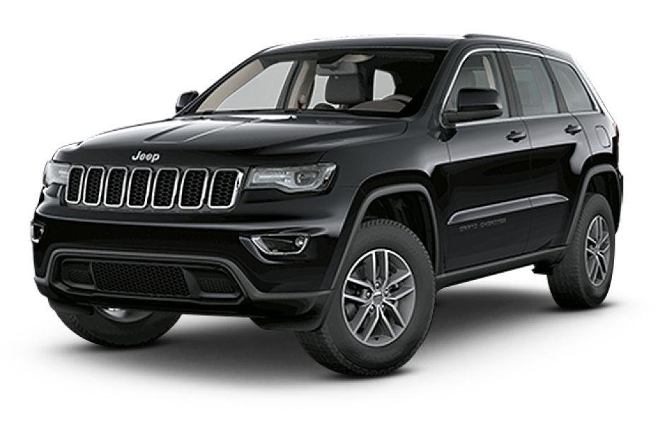 A black Jeep Grand Cherokee SUV is shown from a front-side angle, displaying its distinctive grille, headlights, and rugged design against a white background.